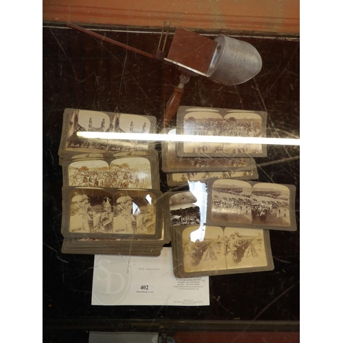 402 - A vintage stereoscope together with a large assortment of stereoscope slides mainly pertaining to Th... 