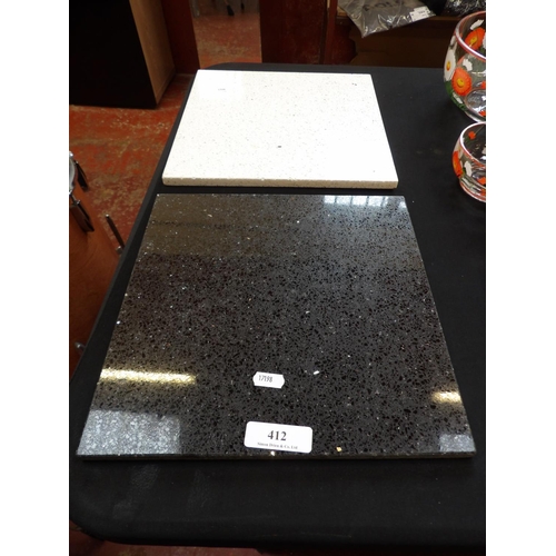 412 - Two granite chopping boards