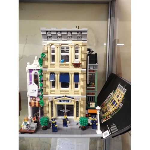 480 - A Lego model of a Police Station complete with mini figures and instruction booklet model no. 10255