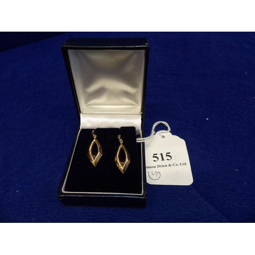 515 - A pair of 9 carat gold pendant drop earrings