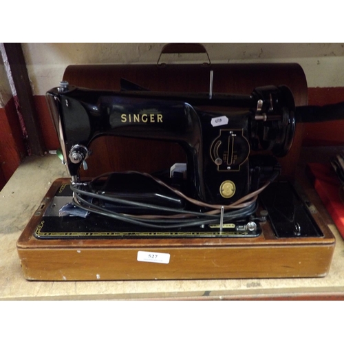 527 - A vintage Singer electric portable sewing machine