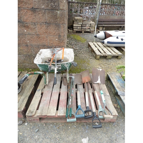 27 - A wheel barrow together with assorted hand tools