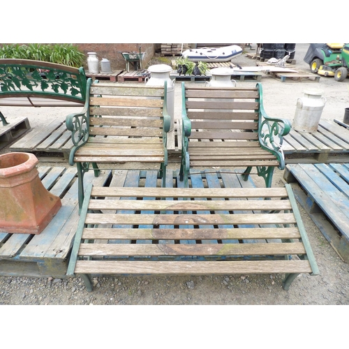 57 - A pair of wrought metal and wooden garden chairs together with a matching bench