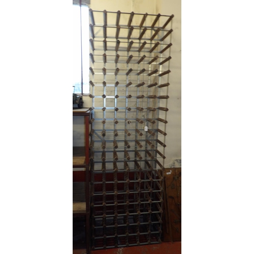 377 - A tall wooden and metallic wine rack