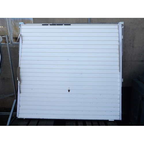 12 - An up and over garage door (195cm x 211cm)