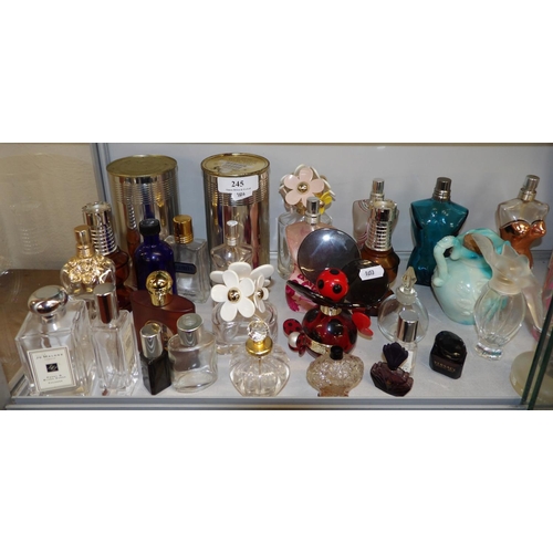 245 - A collection of perfume bottles