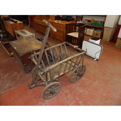 314 - A vintage four wheel dog cart