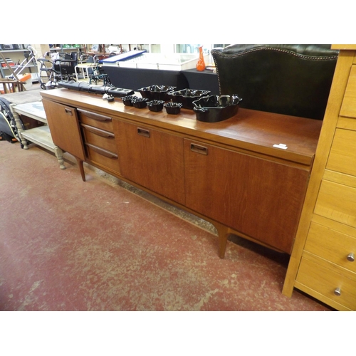 378 - A mid-century G-Plan teak sideboard fitted three doors and three vertical drawers