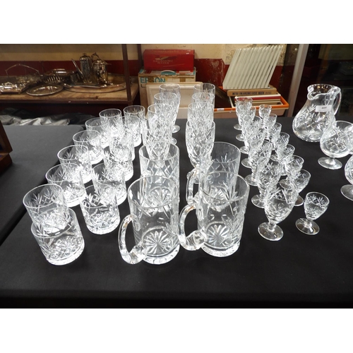 409 - A large and varied accumulation of Royal Doulton Georgian pattern crystal drinking glasses, a water ... 