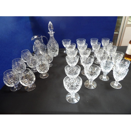 409 - A large and varied accumulation of Royal Doulton Georgian pattern crystal drinking glasses, a water ... 