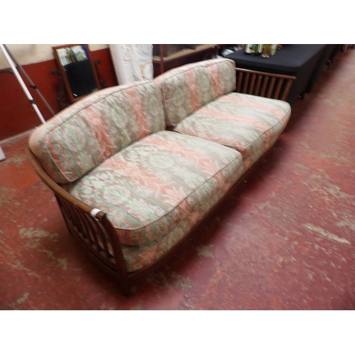 416 - A mid century Ercol couch