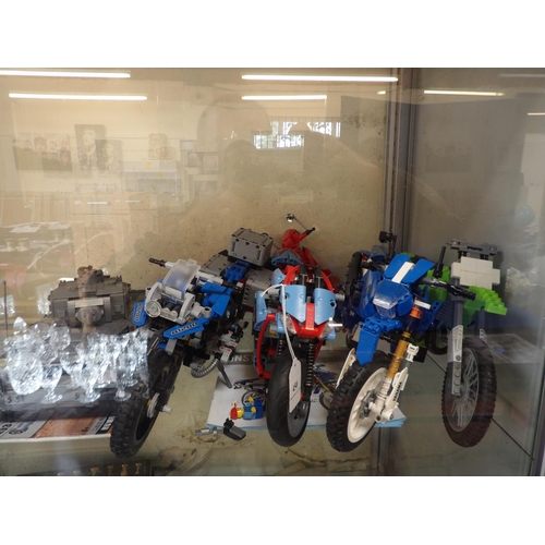 450 - A mixed group of models, four motor cycles, a motor scooter and a German tank