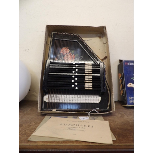 504 - An autoharp in original box and with original documentation