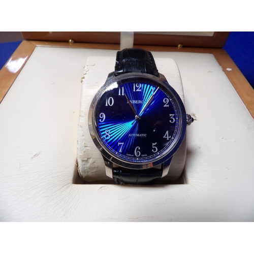 211 - A Faberge limited edition (no. 96) Agathon white 18 carat gold and blue dial M1105 wrist watch with ... 