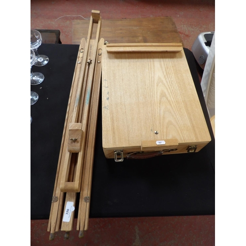 350 - An adjustable artist's easel together with an artist's field box