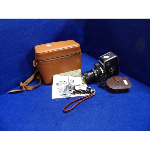 407 - A Bolex cine camera, accessories and case