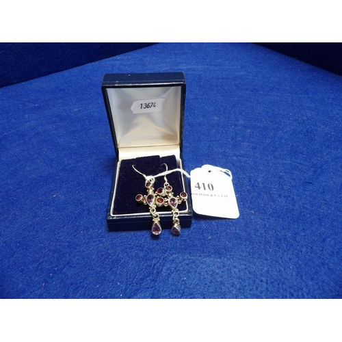 410 - A pair of sterling silver earrings modelled in the form of crosses