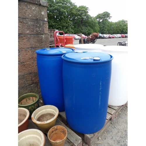 48 - Two blue plastic 200L barrels