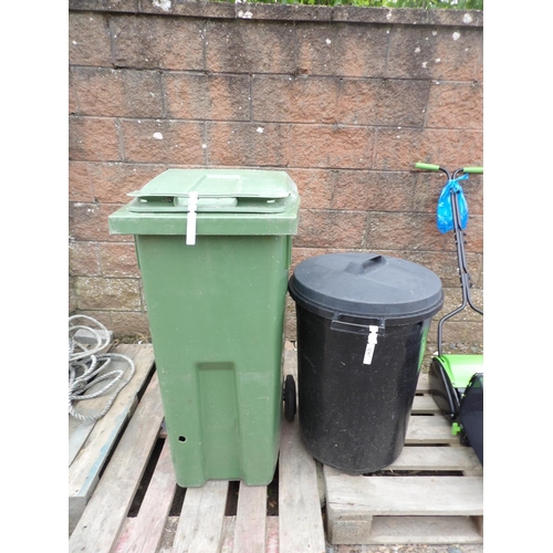 52 - A green wheelie bin (a/f) together with a dustbin