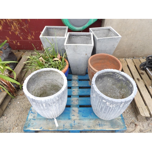 81 - A quantity of fiberglass and terracotta pots