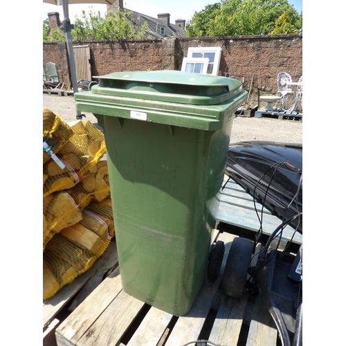 121 - A green PVC wheelie bin