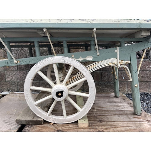 35 - An original nineteenth century Covent Garden market barrow with later additions, the wheels and main... 