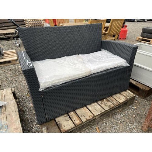 51 - An all weather rattan two seater patio couch