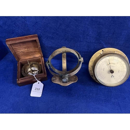 A brass compass enclosed within a brass bound mahogany box modelled in ...