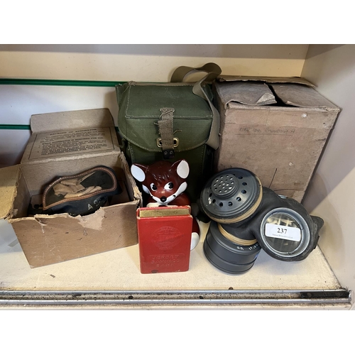 237 - Two vintage gas masks complete with original boxes together with a canvas gas mask bag and vintage m... 