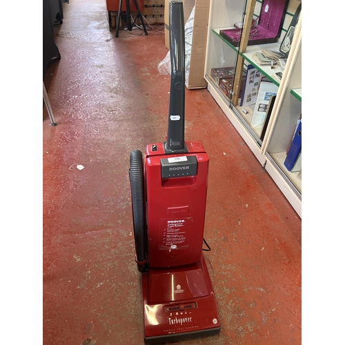 A Hoover turbo power upright vacuum cleaner