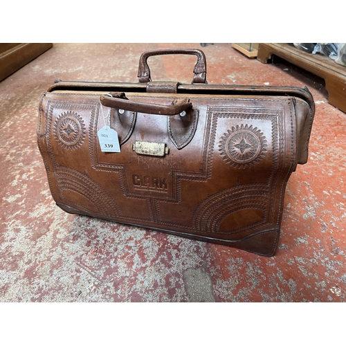 339 - A Clark Construction leather briefcase