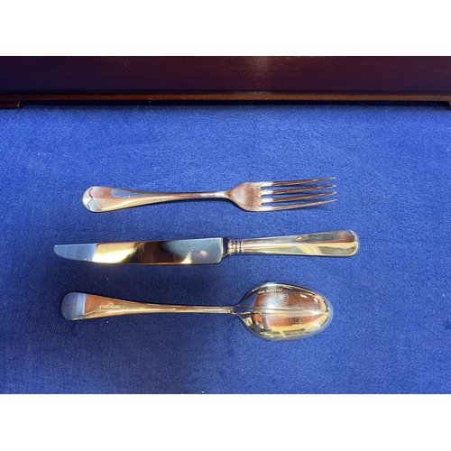 408 - A Mappin & Webb solid silver sixty piece canteen of cutlery