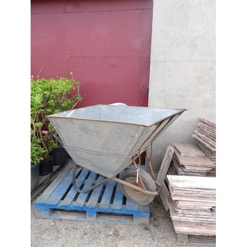 97 - A galvanised garden wheel barrow fitted extension sides