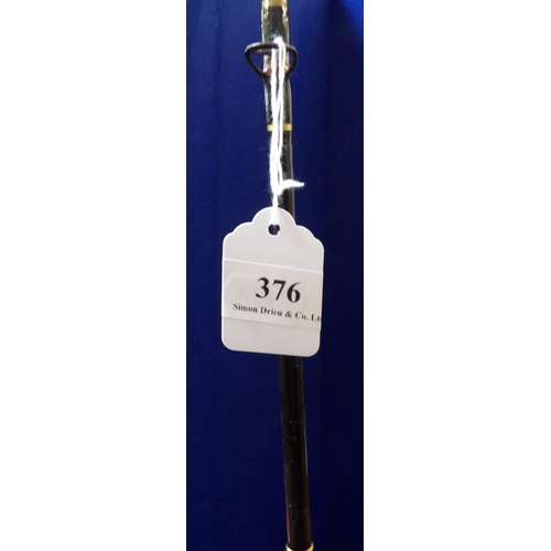 376 - A Shakespeare Uglistik 12lb class boat rod fitted a multiplier reel