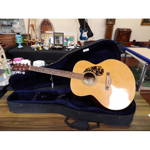 390 - A Wesley acoustic guitar together with another guitar case