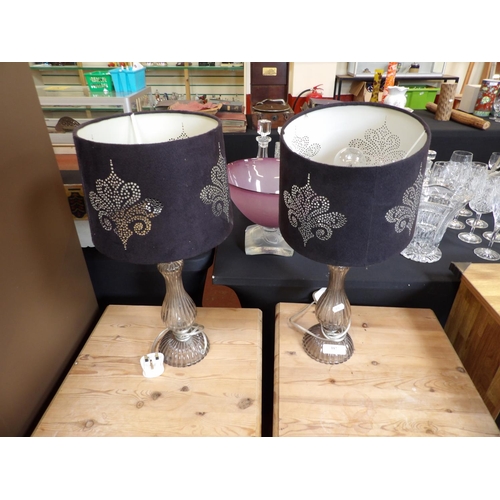 397 - A pair of glass table lamps with reeded design