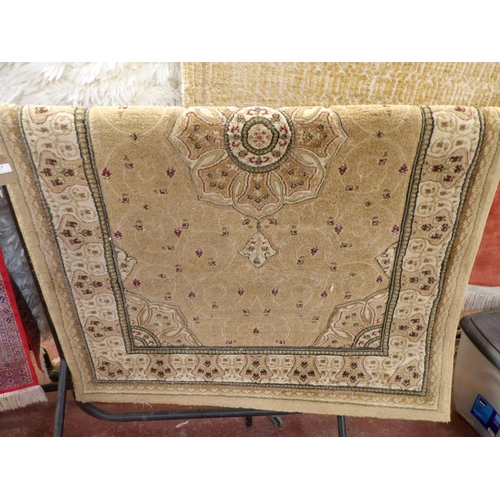 417 - A Heritage floor rug on beige/cream coloured ground (120 x 170cm)