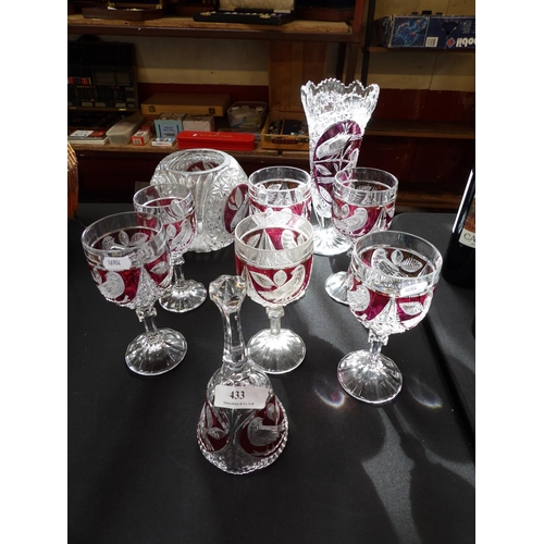 433 - A range of Bohemian drinking glasses, vases and a bell