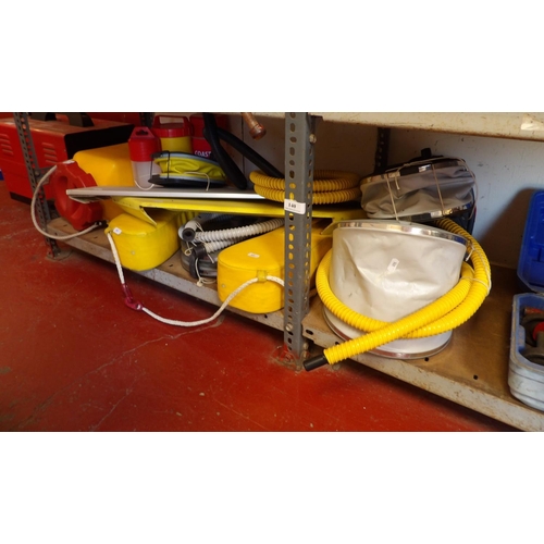 140 - Assorted dinghy pumps, flare containers, dinghy seats, a life buoy etc.