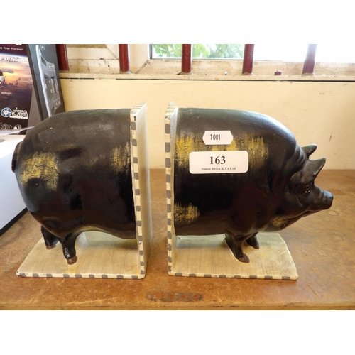 163 - A pair of heavy cast iron book ends modelled in the form of a pig