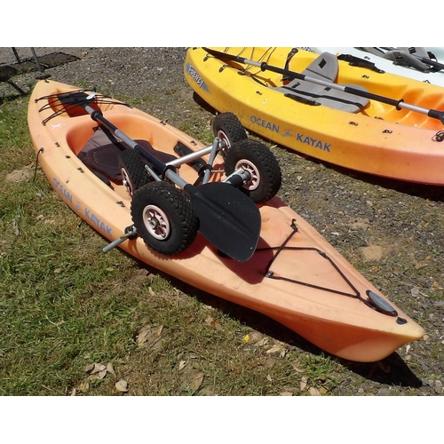 22 - An Ocean Venus 10 kayak complete with paddle and trolley