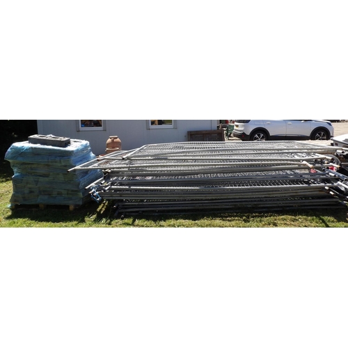 28 - A large quantity of Altrad and Heras galvanised site fencing complete with bases and clips