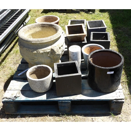 30 - A reconstituted stone garden urn together with other assorted garden planters