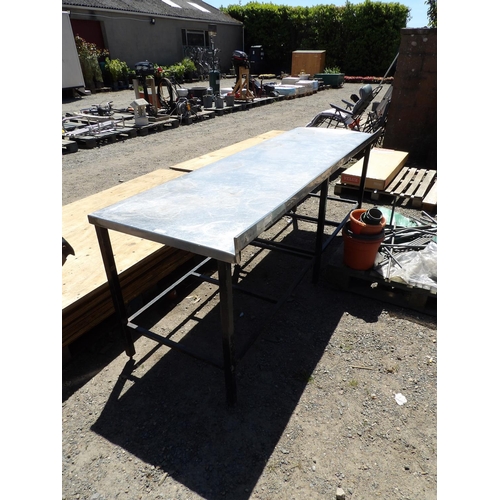 38 - A stainless steel preparation table (240cm)