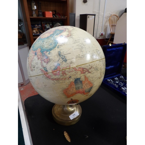 335 - A Repolgle desk globe of the world