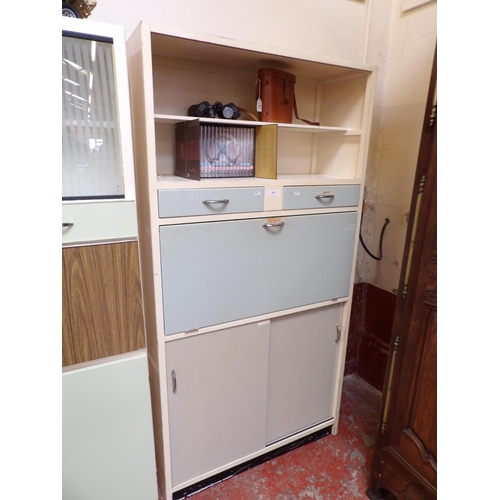 448 - A mid century fall front kitchen cabinet