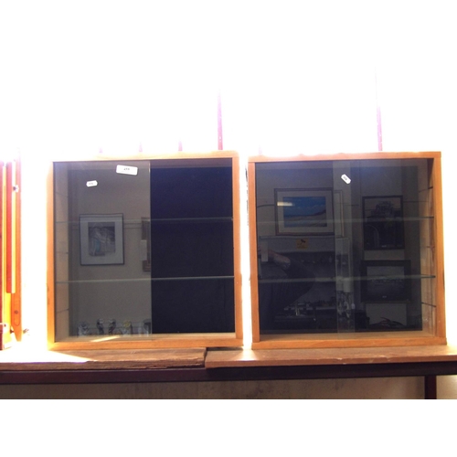 455 - A pair of glazed table/wall display cabinets