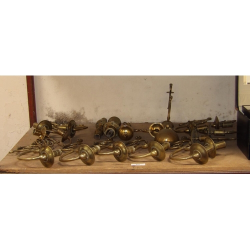 456 - An accumulation of brass candle sconces