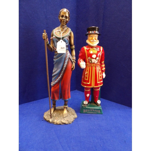 469 - A figure of a Maasai together with another of the Beefeater Yeoman