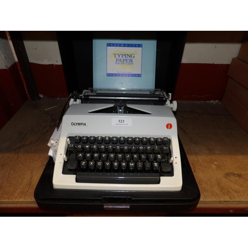 523 - A mid century Olympia portable typewriter